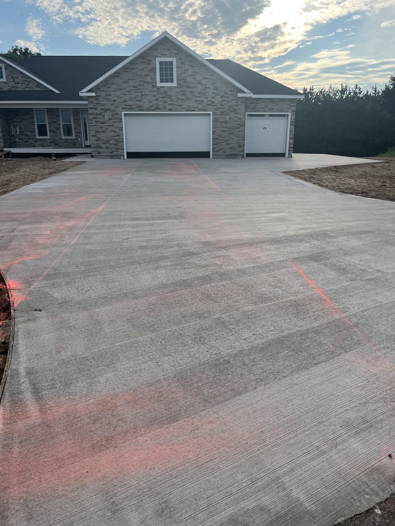 Finished concrete driveway poured by OARA