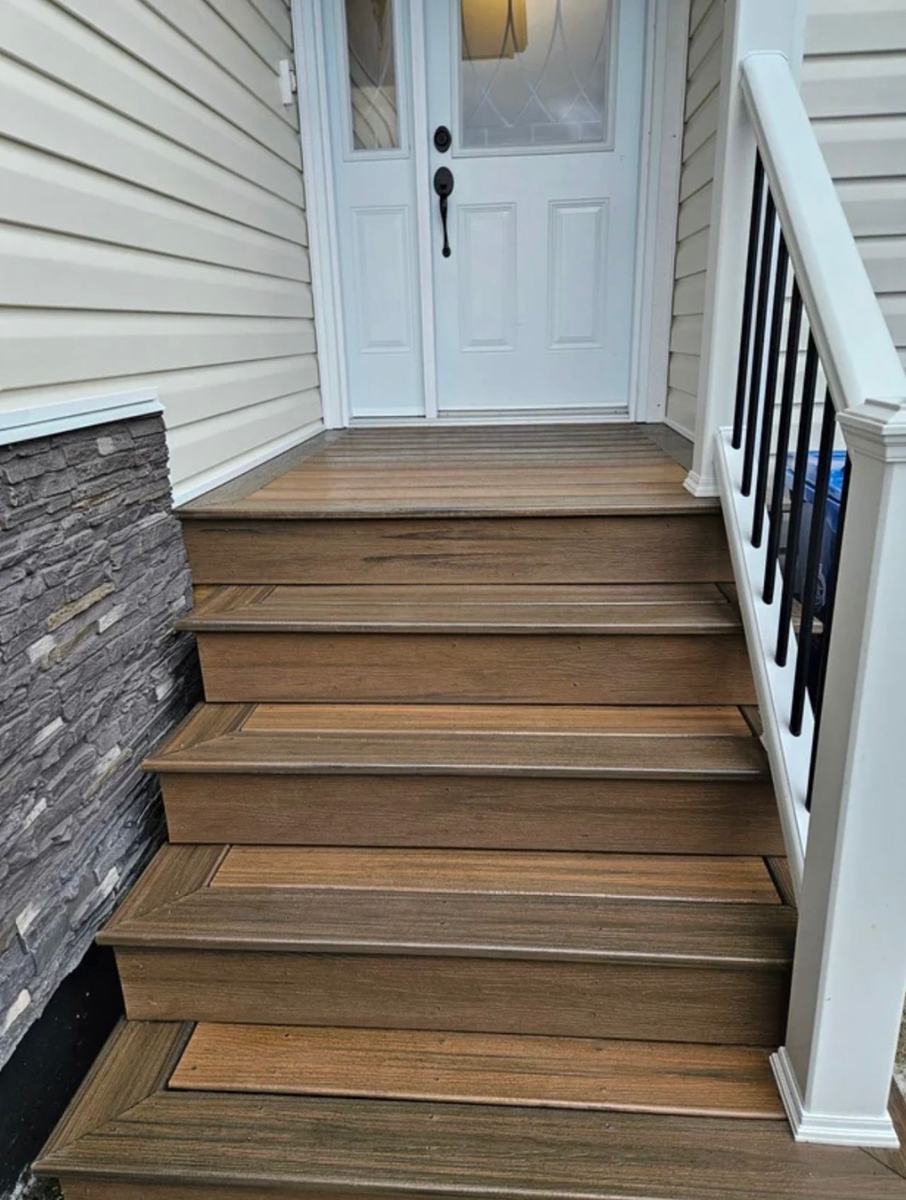 Interior stair build with wood treads and railing