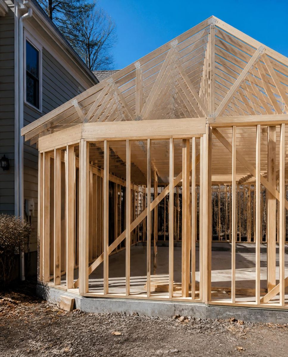 New wood framing on a residential addition with roof trusses