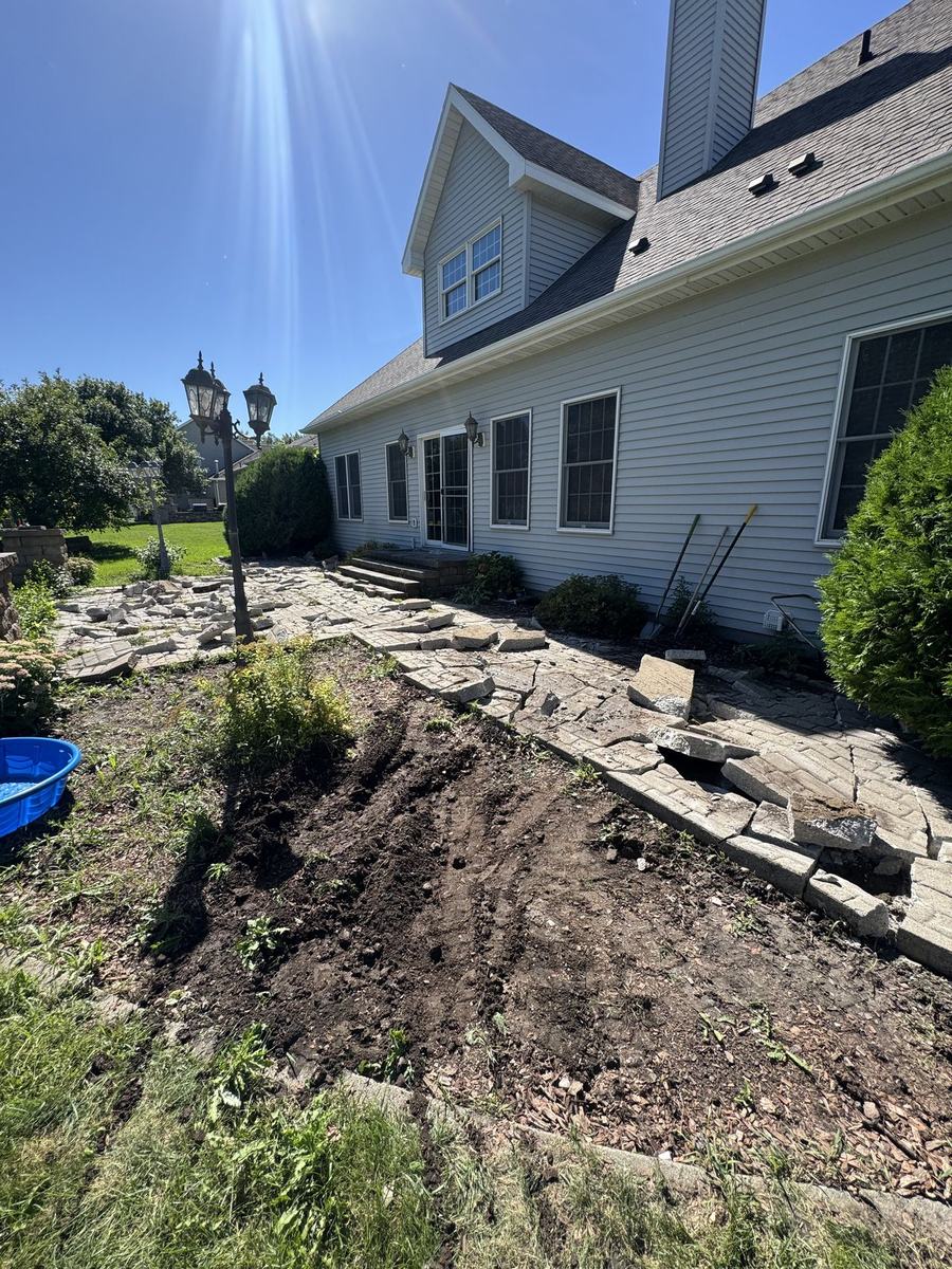 Regraded, cleared yard by OARA